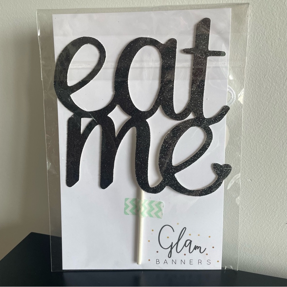 Glam Banner-“Eat Me” black sparkle cake topper & tag